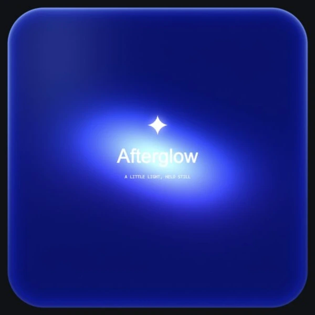 A rounded cobalt glass card with a soft pale centre and original Afterglow lettering